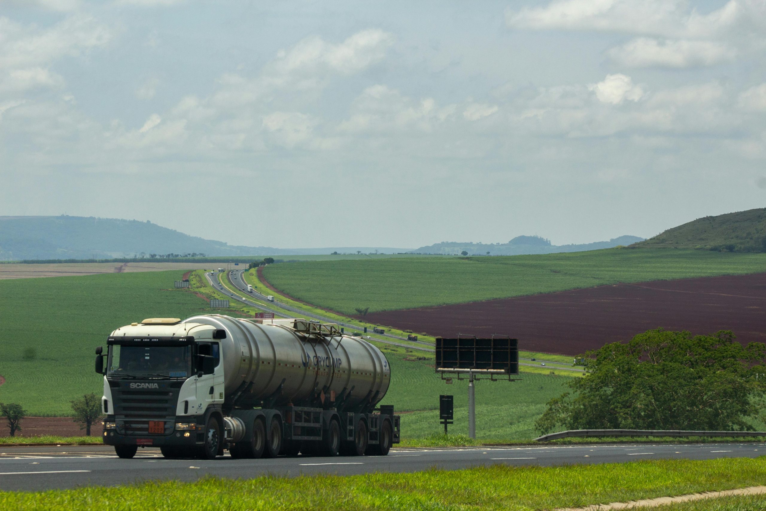 loaded truck with greenary around